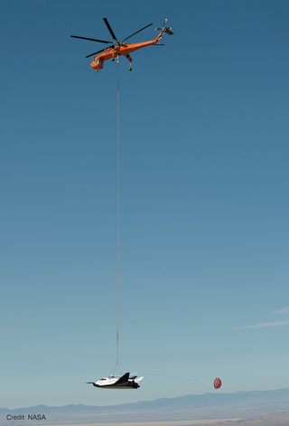 Illustration for article titled Sierra Nevada Challenges NASA's Crew Transport Contracts